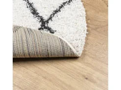 Alfombra de pelo largo moderna crema y negro Ø 120 cm