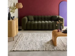 Alfombra interior con patrón moteado crema