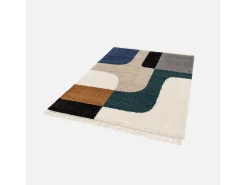 Alfombra interior shaggy con patrones geométricos crema