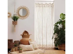 Cojín desenfundable con flecos y macramé