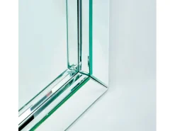 Espejo de pared Octy rectangular de cristal transparente.