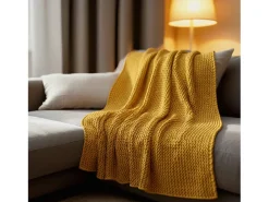Manta plaid amarilla relieve con borlas 130x170cm TRICOT - SACASA
